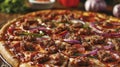 A detailed close-up view of a freshly baked pizza placed on a wooden table Royalty Free Stock Photo