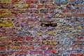 Detailed close up view on very old and weathered brick walls with cracks found in London Royalty Free Stock Photo