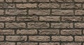 Detailed Close-up Texture of Weathered Brown Brick Wall with Dark Grout Lines background Royalty Free Stock Photo