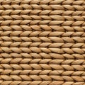 Detailed close-up of a woven basket pattern. Interlaced strips of light brown natural Royalty Free Stock Photo