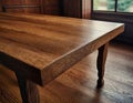 A detailed closeup of a beautiful brown hardwood table with a grainy texture
