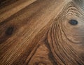 A detailed closeup of a beautiful brown hardwood table with a grainy texture