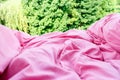 Detailed closeup of pink quilt bedding