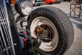 detailed closeup view of old classic vintage car wheel and other brake components Royalty Free Stock Photo