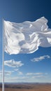 Detailed closeup of a white flag waving proudly on a flagpole