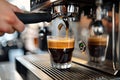 Barista making espresso fresh coffee pouring into glass cup from machine Royalty Free Stock Photo
