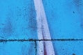 Detailed and colorful close up at cracked and peeling paint on concrete wall textures in high resolution Royalty Free Stock Photo