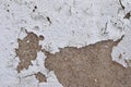Detailed and colorful close up at cracked and peeling paint on concrete wall textures in high resolution Royalty Free Stock Photo