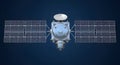 Modern Satellite with Solar Panels Against Dark Blue Background Royalty Free Stock Photo