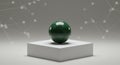 Glossy green marble sphere on a presentation pedestal Royalty Free Stock Photo