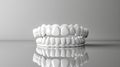 Detailed Denture Model on Reflective Surface. Generative ai Royalty Free Stock Photo