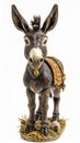 Detailed Donkey Figurine with Golden Saddle on White Background Royalty Free Stock Photo