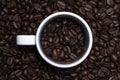 Detailed full frame top view of dark brown coffee beans