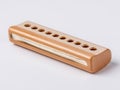 Close Up Of A Wooden Harmonica With Ten Holes On A White Background Royalty Free Stock Photo