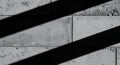 Stark Concrete Wall with Diagonal Shadows Royalty Free Stock Photo