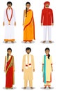 Set of different standing indian young adult women and men in the traditional clothing isolated on white background in