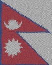 Detailed Illustration of a Knitted Flag of Nepal