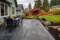 detailed image of a stone patio in a craftsman homes backyard