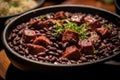 Detailed image of a traditional feijoada, a rich blend of black beans and pork, in a rustic pot.