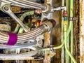 Detailed image of inside of an airplane. Hydraulic lines, valves, tubes, switches and wires Royalty Free Stock Photo