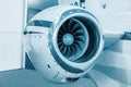 Detailed insigh tturbine blades of an aircraft jet engine, colored technical blue, business jet engine close up high detailed view Royalty Free Stock Photo