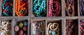 A detailed jewelry box displaying a collection of multicolored beads and intricate jewelry. Royalty Free Stock Photo