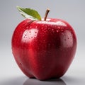 Detailed 8k Photo Of Red Apple With Green Leaf On Gray Surface Royalty Free Stock Photo