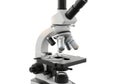 A detailed laboratory microscope with multiple lenses and stage isolated on white background Royalty Free Stock Photo