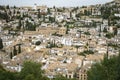 Detailed landscape photo of Albacin district, Granada old town, Andalusia, Spain 2019. White houses with tiled roofs surrounded by