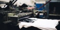 A Detailed Look at a Screen Printing Machine in Action, Creating Custom Designs on White T-Shirts in a Modern Workshop Environment Royalty Free Stock Photo