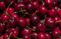 Detailed macro of delicious fresh ripe red cherries, food background Royalty Free Stock Photo