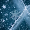 Macro image of a snowflake with intricate hexagonal patterns sits on a textur Royalty Free Stock Photo