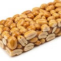 Close-up Macro Shot of a Peanut Brittle Candy Bar with Visible Peanuts and Caramel snack Royalty Free Stock Photo