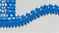 Blue Needlepoint Embroidery on White Canvas Royalty Free Stock Photo