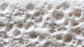 Adhesive expanding foam texture macro, irregular surface detail, construction material photography, insulation foam close-up Royalty Free Stock Photo