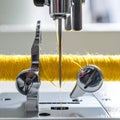 Precision Sewing Machine Needle and Yellow Thread Royalty Free Stock Photo