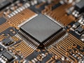 Detailed macro shot of a central processing unit chip mounted on a printed circuit board with intricate copper traces and Royalty Free Stock Photo