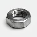 Close-up Metal Hex Nut on White Background (Industrial Hardware) Royalty Free Stock Photo