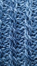 Close-up Macro Shot of Blue Knitted Fabric with Cable Knit Pattern Royalty Free Stock Photo