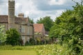 Detailed, majestic view of an unusual, Grade 2 listed, stone built manor house. Royalty Free Stock Photo