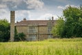 Detailed, majestic view of an unusual, Grade 2 listed, stone built manor house. Royalty Free Stock Photo