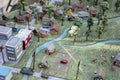 Detailed miniature toy village with roads, buildings, and a charming farm Royalty Free Stock Photo