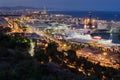 Detailed panoramic view on night illumination of Barcelona port with cruising liners, Spain Royalty Free Stock Photo