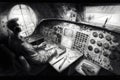 detailed pencil sketch of aircraft cockpit, with instruments and controls visible