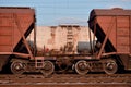 Detailed photo of railway freight car. A fragment of the component parts of the freight car on the railroad in dayligh Royalty Free Stock Photo