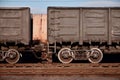 Detailed photo of railway freight car. A fragment of the component parts of the freight car on the railroad in dayligh Royalty Free Stock Photo