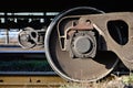 Detailed photo of railway freight car. A fragment of the component parts of the freight car on the railroad in dayligh Royalty Free Stock Photo