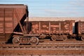 Detailed photo of railway freight car. A fragment of the component parts of the freight car on the railroad in dayligh Royalty Free Stock Photo