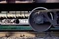 Detailed photo of railway freight car. A fragment of the component parts of the freight car on the railroad in dayligh Royalty Free Stock Photo