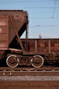 Detailed photo of railway freight car. A fragment of the component parts of the freight car on the railroad in dayligh Royalty Free Stock Photo